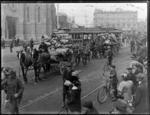 Horse drawn carts transporting World War I troops' baggage, Cathedral Square, Christchurch