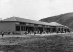 Buildings of Hutt Central School with children playing alongside