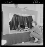 Puppeteers John Croskery and his cousin M Doreen Cochrane, setting up a puppet show