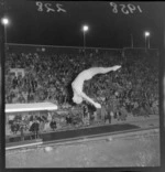 Diver, performing a somersault, evening, Olympic pool, Naenae, Wellington