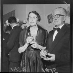 Unidentified man and woman at a Wine and Food Society evening [Wellington?]