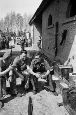 Kaye, George, 1914- :Three unidentified cooks from D Company, 21 NZ Bn, in the forward area  near the Senio River, Italy