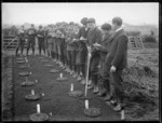 Teacher and boy students of Stratford District High School at an outdoor  'Rural Studies' class