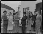 [Tasman Empire Airways Ltd?], Captain McGerant, presenting a gift to the Mayor of Auckland, [Suva, Fiji?]