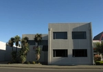 Building_with_Cabbage_Trees_Christchurch_March_2009.jpg