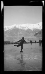 Man ice skating on Lake Tekapo