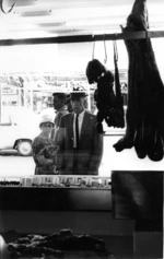 couple ouside butchers shop 1968.tif