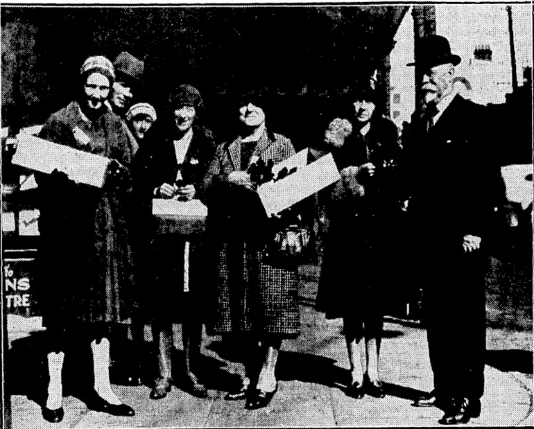 Image: Evening Post" Photo.. POPPY DAY IN WELLINGTON.—Good business has been done during the day by a large contingent of poppy sellers.' The proceeds are to be devoted to; the. unemployment funds of the Wellington Returned Soldiers' Association. The photograph was taken, at the corner of Willis street, where 'Mrs. Sol Myers, J.P., third from left, was in charge. (Evening Post, 24 April 1931)