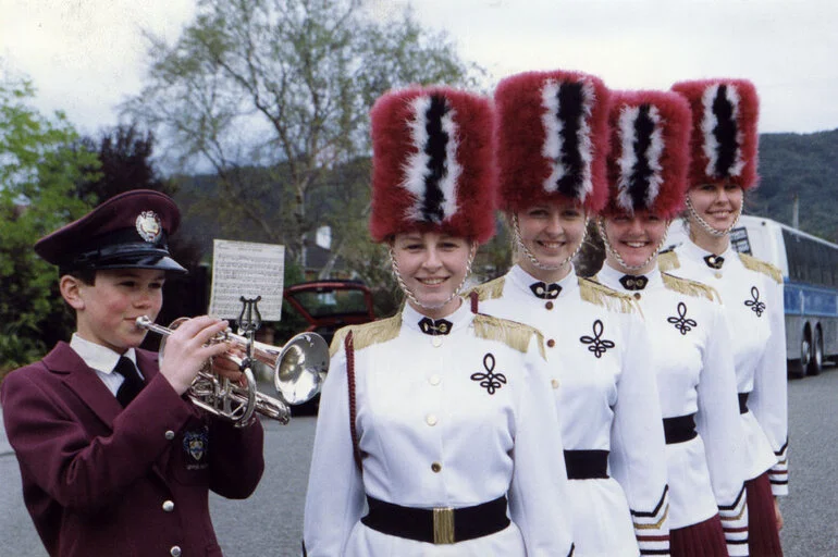 Image: Glennettes marching team members and Miles Dean, 12, cornet.