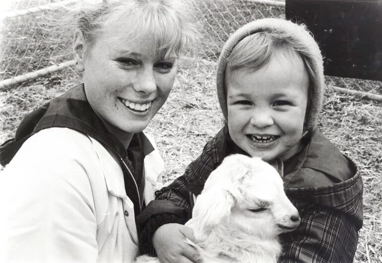 Image: Wallaceville Research Centre; farm days; Amy Long shows Aimee Richards a baby goat.