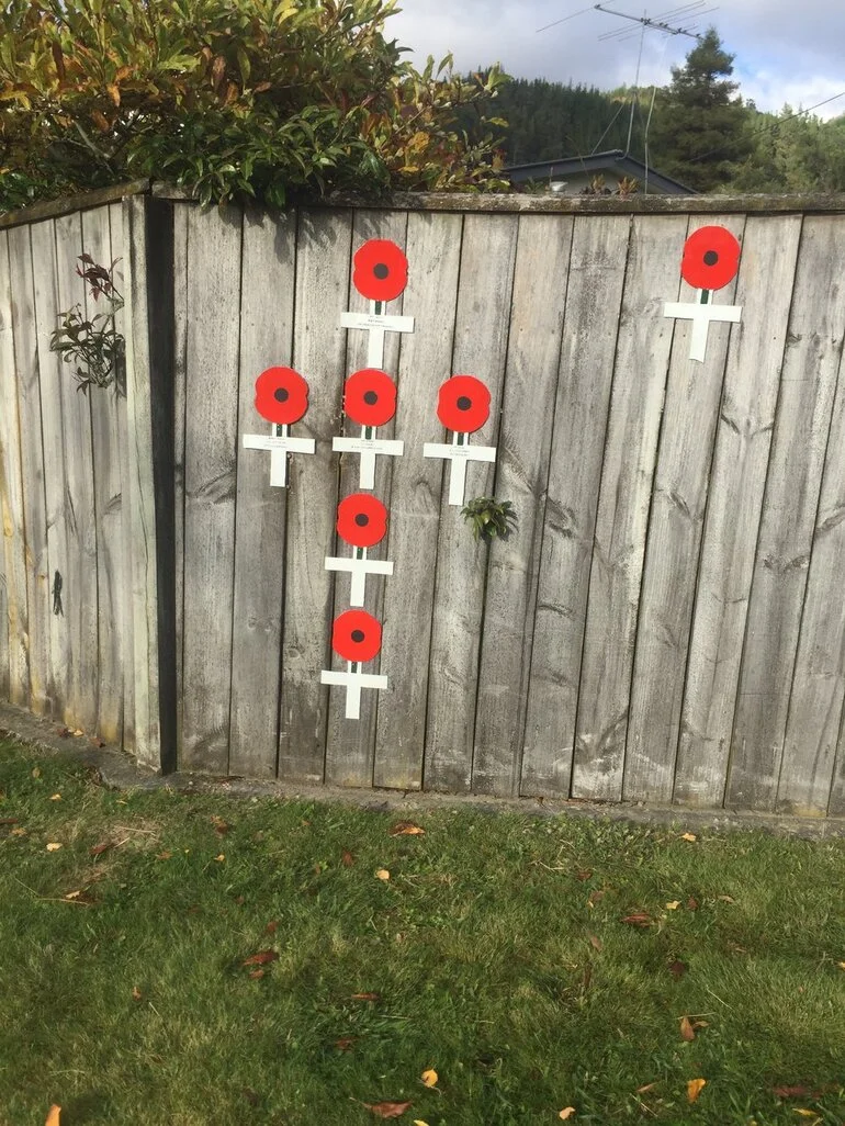Image: Poppies fence tribute, Pinehaven, Anzac Day 2020