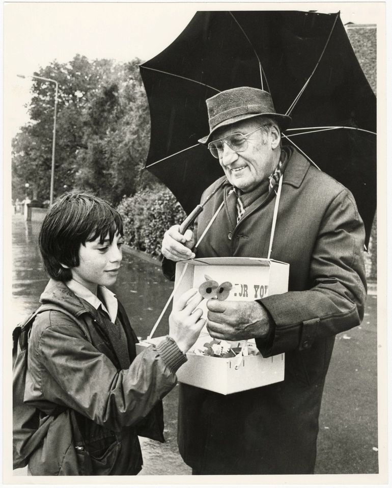 Image: Selling poppies in the rain