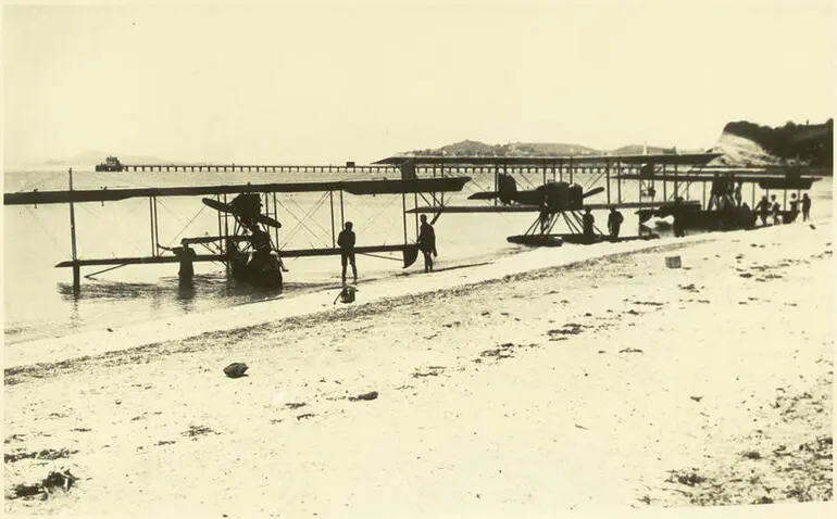 Image: Black and white photograph of Walsh Brothers Flying School planes on the beach at Mission Bay