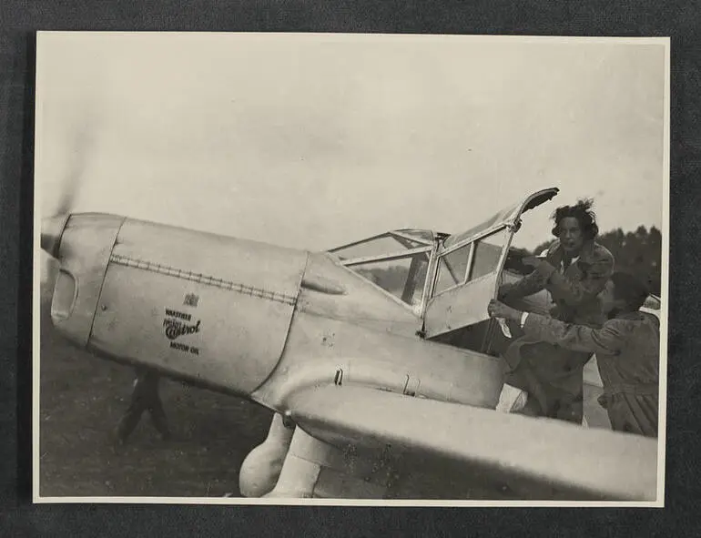 Image: Jean Batten at the cockpit door of G-ADPR after the Australia-England return flight was diverted to Naples