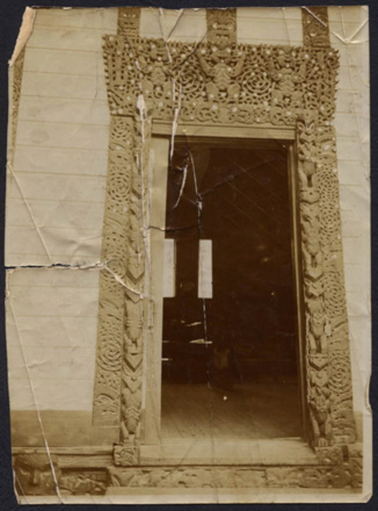 Image: [Marae doorway with extensive carving]
