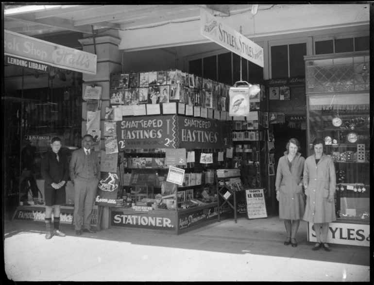 Image: Hall's Stationery Shop, bookshop and magazines with staff out front, Hastings, Hawke's Bay District