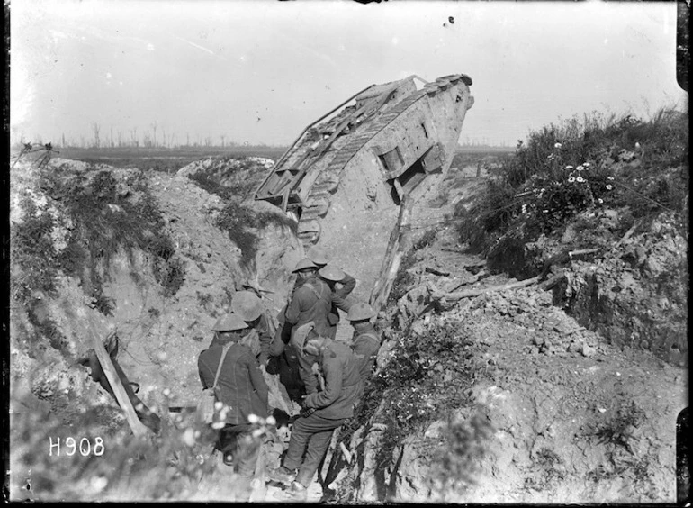 Image: New Zealand troops, and a tank, in a trench at Gommecourt Wood, France, during World War 1