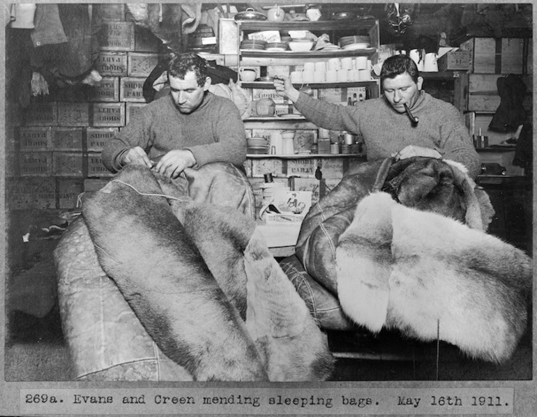 Image: Thomas Crean and Petty Officer Evans mending sleeping bags, Antarctica