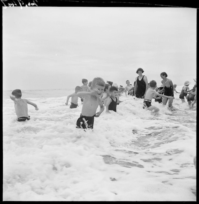 Image: Children from the Otaki Children's Health Camp playing in the surf at Otaki Beach