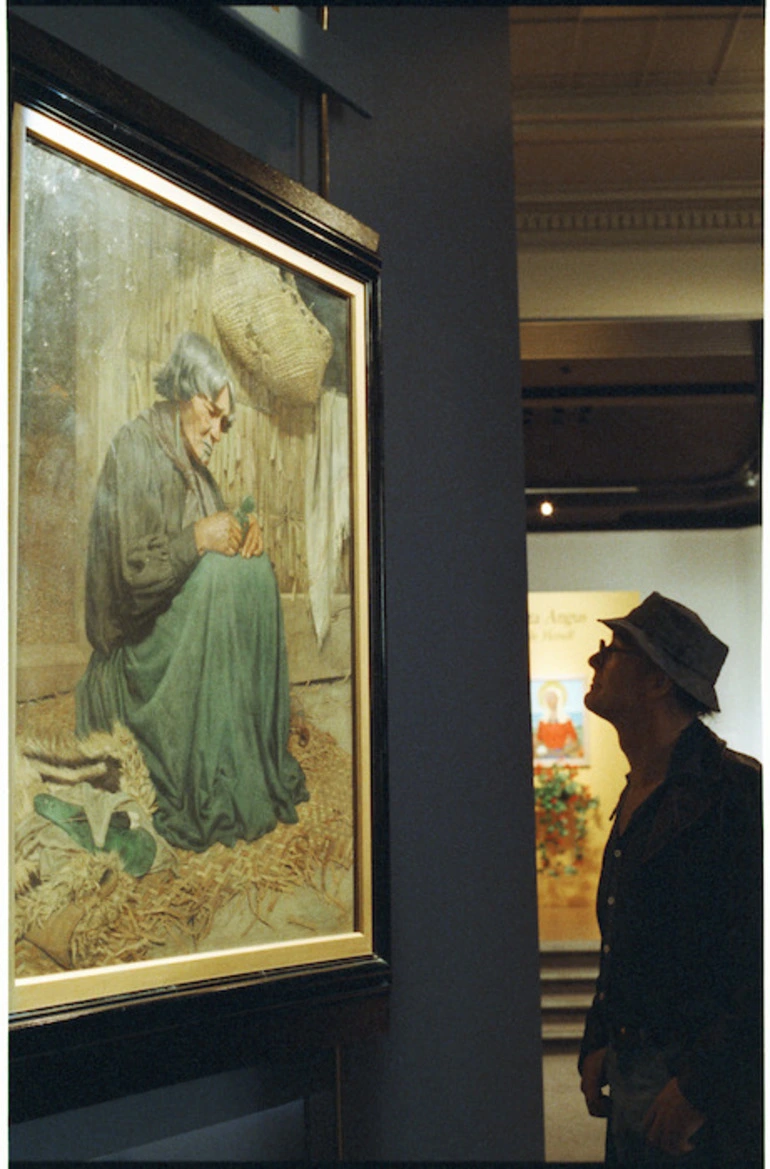 Image: Visitor views Goldie's painting The Widow at the National Art Gallery, Wellington - Photograph taken by Mark Coote