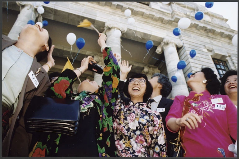 Image: Member of Parliament Pansy Wong releases balloons to mark 130 years of Chinese settlement in New Zealand, Parliament steps, Wellington - Photograph taken by Dave Hansford