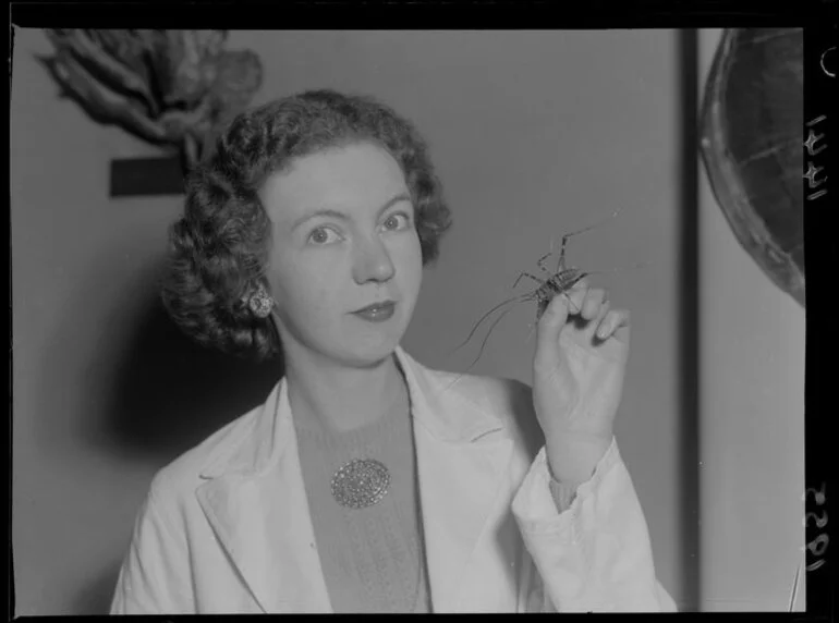 Image: Miss A M Richards with a cave weta