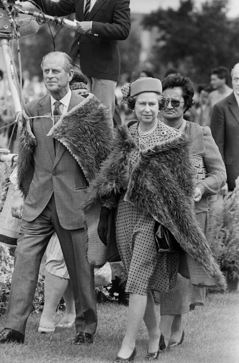 Image: Queen Elizabeth and the Duke of Edinburgh wearing kiwi feather cloaks - Photograph taken by John Nicholson