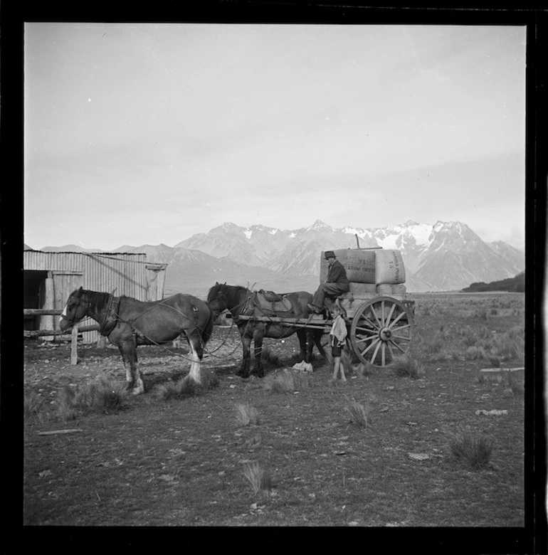 Image: Two horse cart carrying wool bales