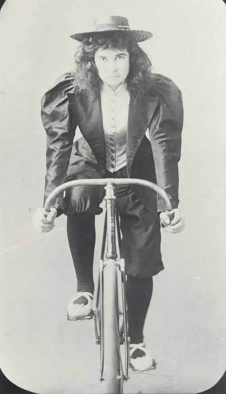 Image: Woman cyclist in knickerbockers