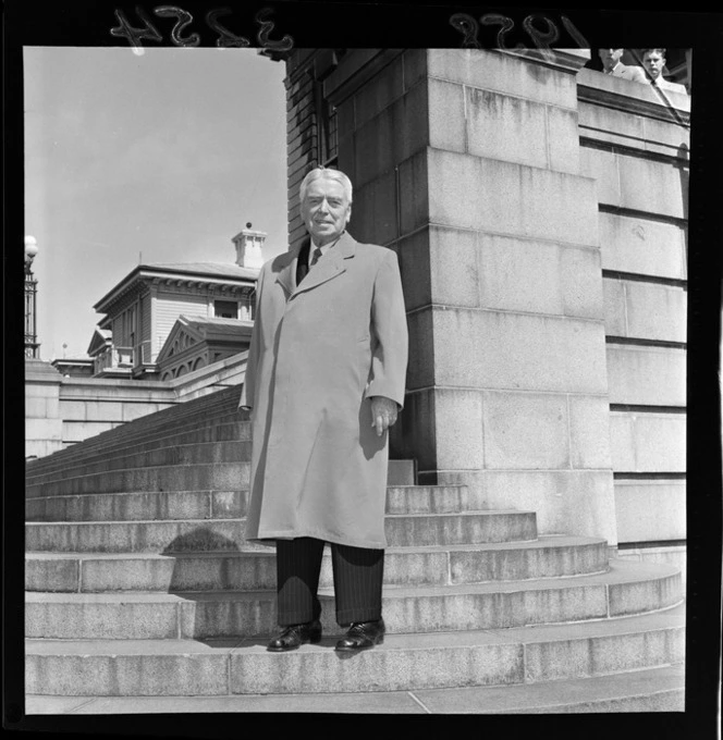 Walter Nash on departure for foreign trip, on the steps of Parliament, Wellington