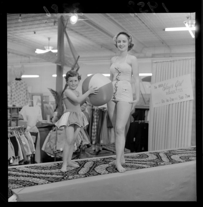 Child and woman modeling swimsuits on catwalk at Kirkcaldie & Stains department store, Wellington
