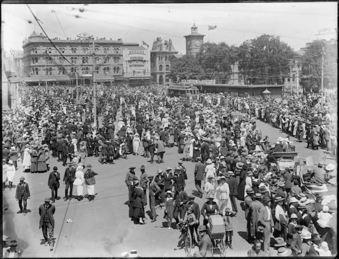 Crowd in Cathedral Square, Christchurch, celebrating Armistice Day. Head, Samuel Heath, 1868-1948 :Negatives. Ref: 1/1-007108-G. Alexander Turnbull Library, Wellington, New Zealand. /records/22898377