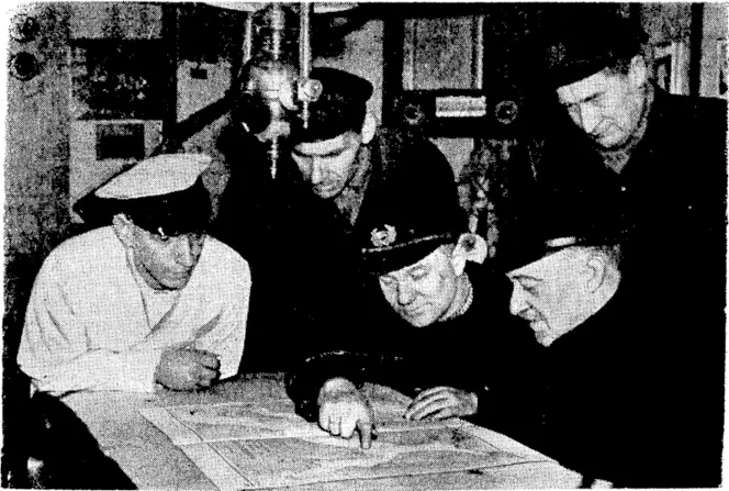 Fox Photo.' Captains of Norwegian,vessels which-made their way to British ports following the progress of the latest example of :; Nazi blitzkrieg on a map on board the Altdir. Right, General yon Falkenhorst, commander of the German forces in, Norway, photographed with his staff. (Evening Post, 04 May 1940)