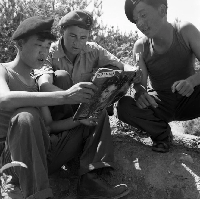 [Signaller J G Coleman with two KATCOM signalmen, Korea]