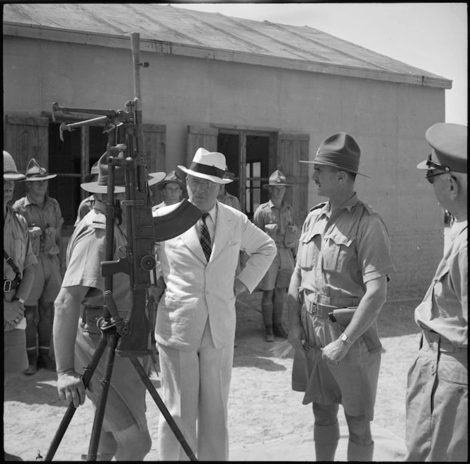 Prime Minister Peter Fraser with anti-aircraft gun at the NZ Infantry Training Depot, Maadi