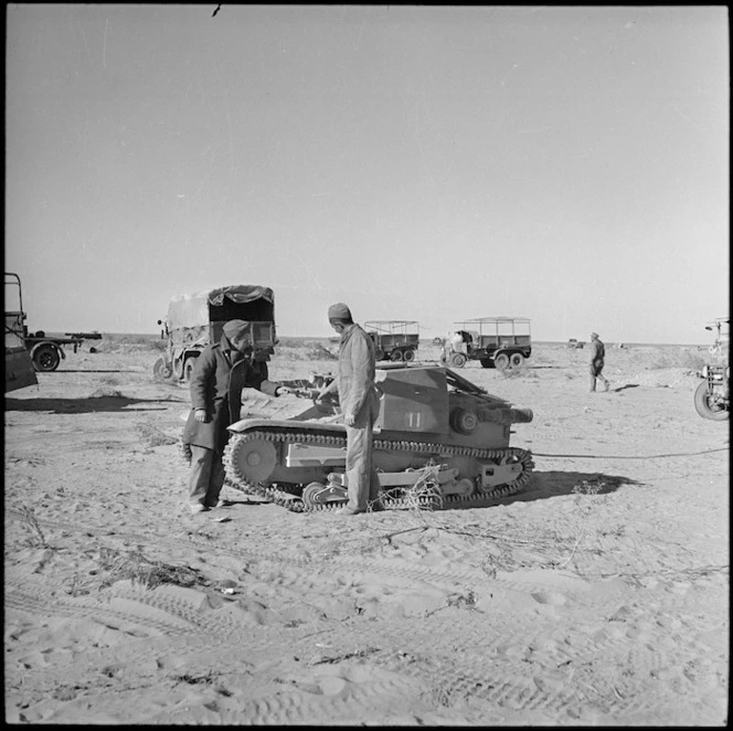 NZ troops and captured Italian tank and transport