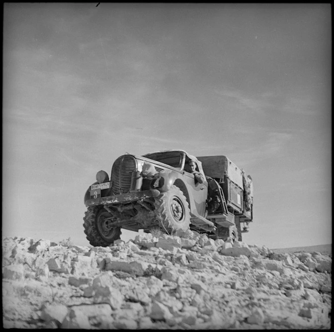 Typical artillery truck travels over stony ground in the Western Desert