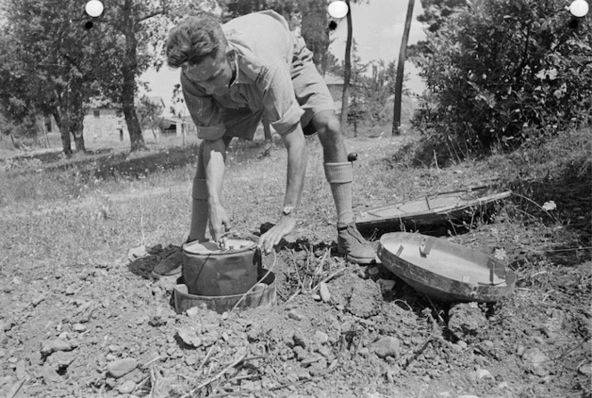 Sound ranging equipment being used by a New Zealand soldier to locate enemy guns, Florence area, Italy - Photograph taken by George Kaye