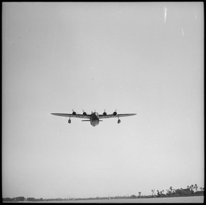 Imperial Airways flying boat with air mail landing on the Nile at Cairo