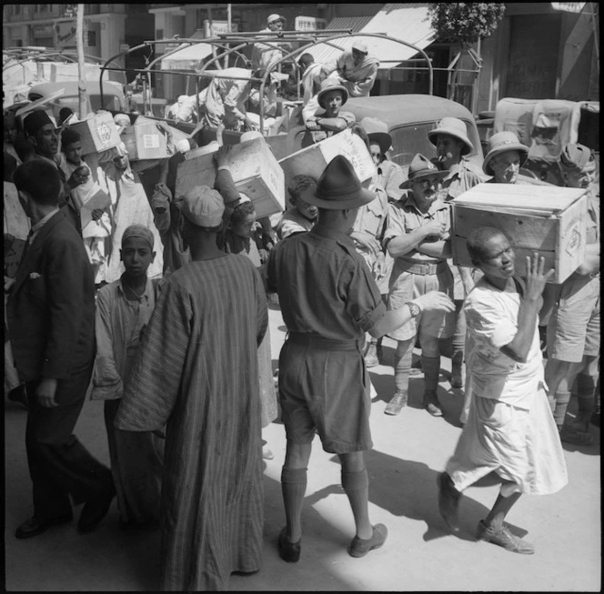 Unloading consignment of apples for the NZ Forces Club, Cairo