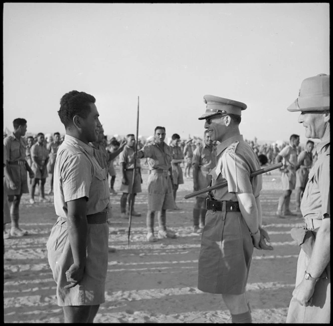 King of Greece talking with Cpl Anaia Amohau, composer of the song 'Maori Battalion', Helwan