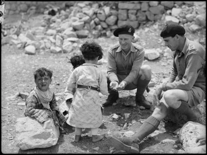 Members of NZ Divisional Cavalry with Syrian children, World War II - Photograph taken by H Paton