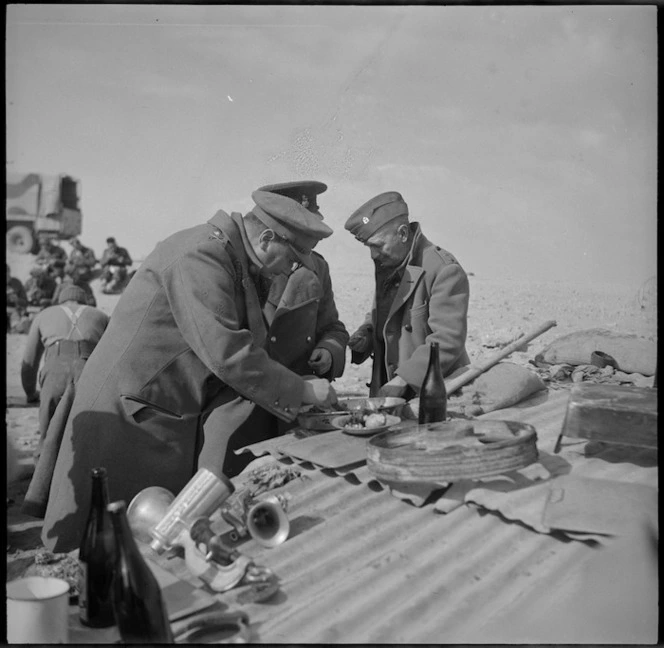 GOC Freyberg, with senior officers, enjoys Christmas dinner, Egypt, World War II