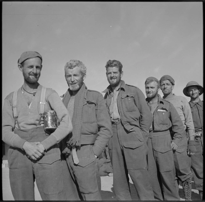 New Zealanders back at NZ Base Camp after imprisonment in Bardia, Libya - Photograph taken by M D Elias