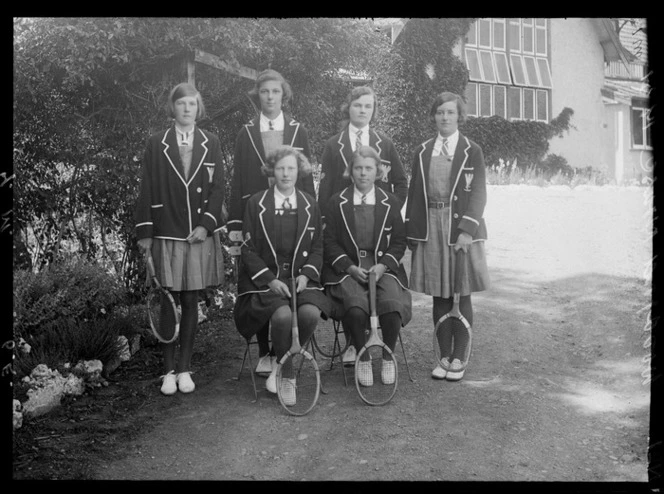 Woodford House girl's tennis team in school uniforms, Havelock North, Hawke's Bay District