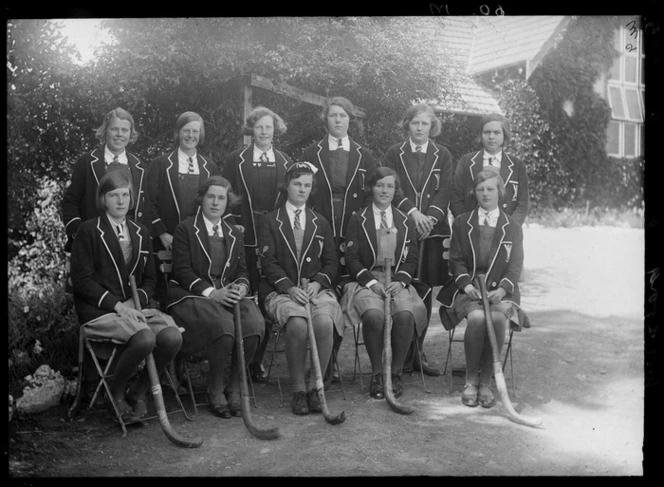Woodford House girl's hockey team in school uniforms, Havelock North, Hawke's Bay District