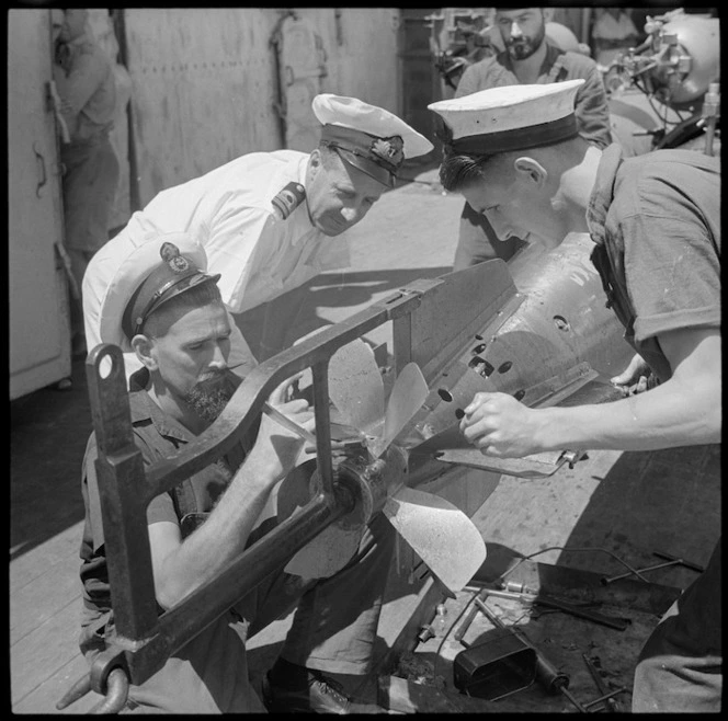 Torpedo maintenance on HMS Leander - Photograph taken by M D Elias