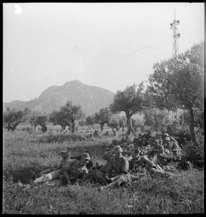 Axis POWs resting among olive groves in Tunisia, World War II - Photograph taken by M D Elias