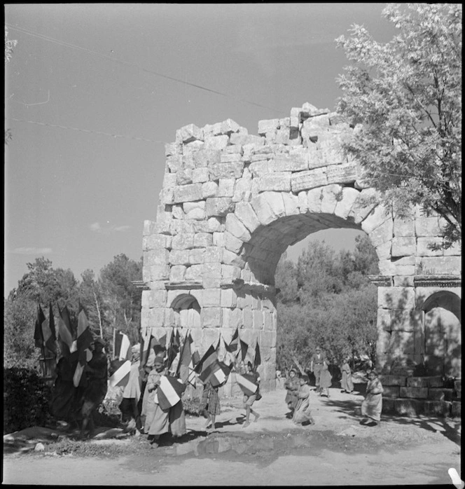 Local inhabitants with French decorations for sale outside Tunis - Photograph taken by M D Elias