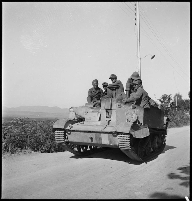 German prisoners ride in a British bren carrier to a POW camp, Tunisia - Photograph taken by M D Elias